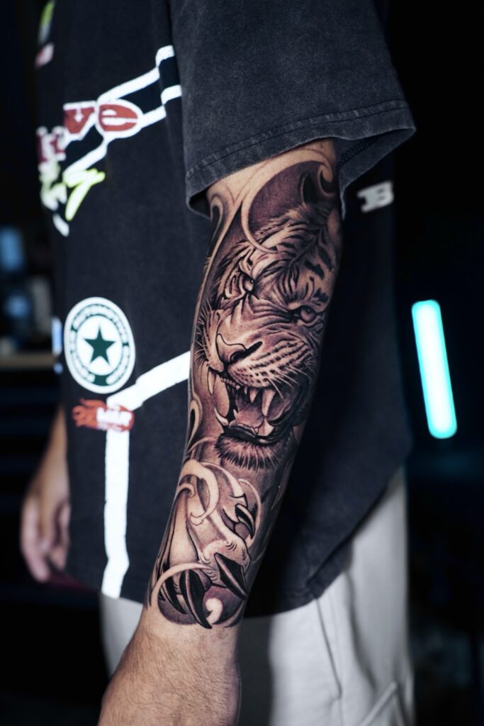 Tiger forearm, black-and-grey realism