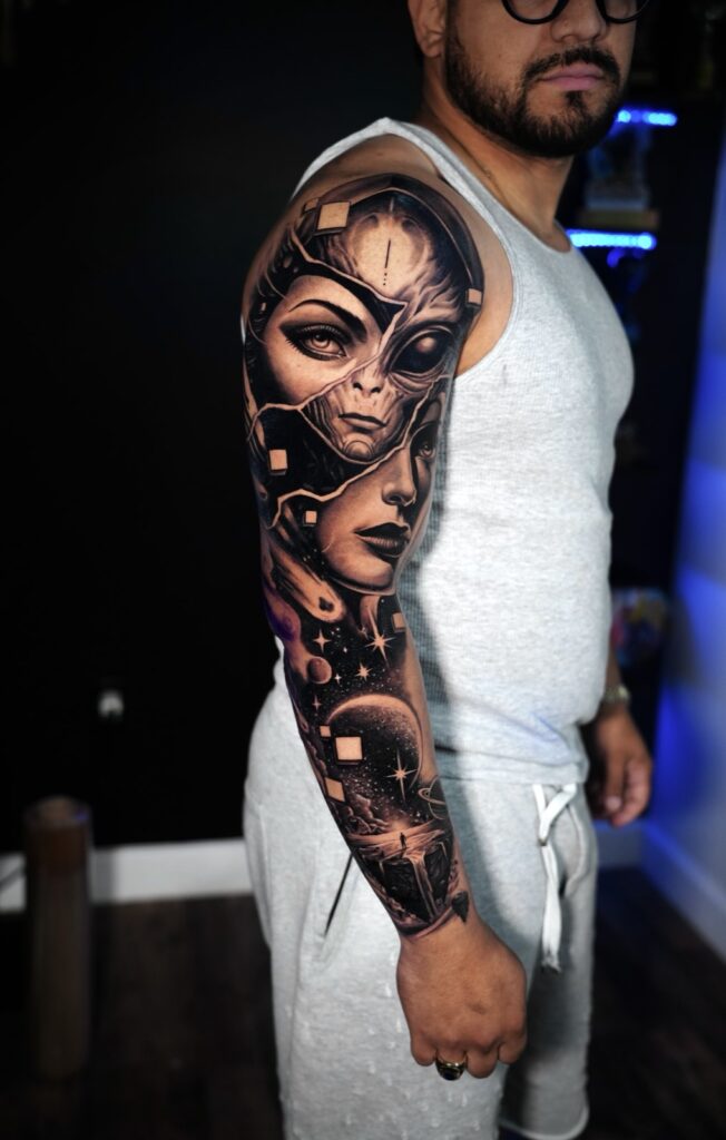 Full sleeve, surreal black-and-grey by Arly Rojano